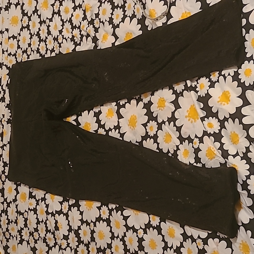 Divided, black, sequined pants.